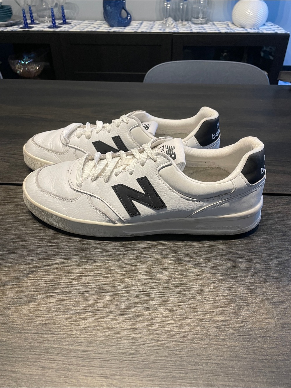 New Balance White Leather Sneakers with Black 'N' Accent